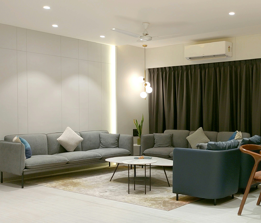 Elegant living room with premium curtains installed by Kinetic Drapes